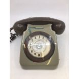 A vintage green bell telephone (TELE 8746 G, B.T. QC/CCF, BATCH SAMPLED FWR 83/1)