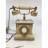 A vintage white bell telephone (a/f)