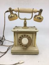 A vintage white bell telephone (a/f)