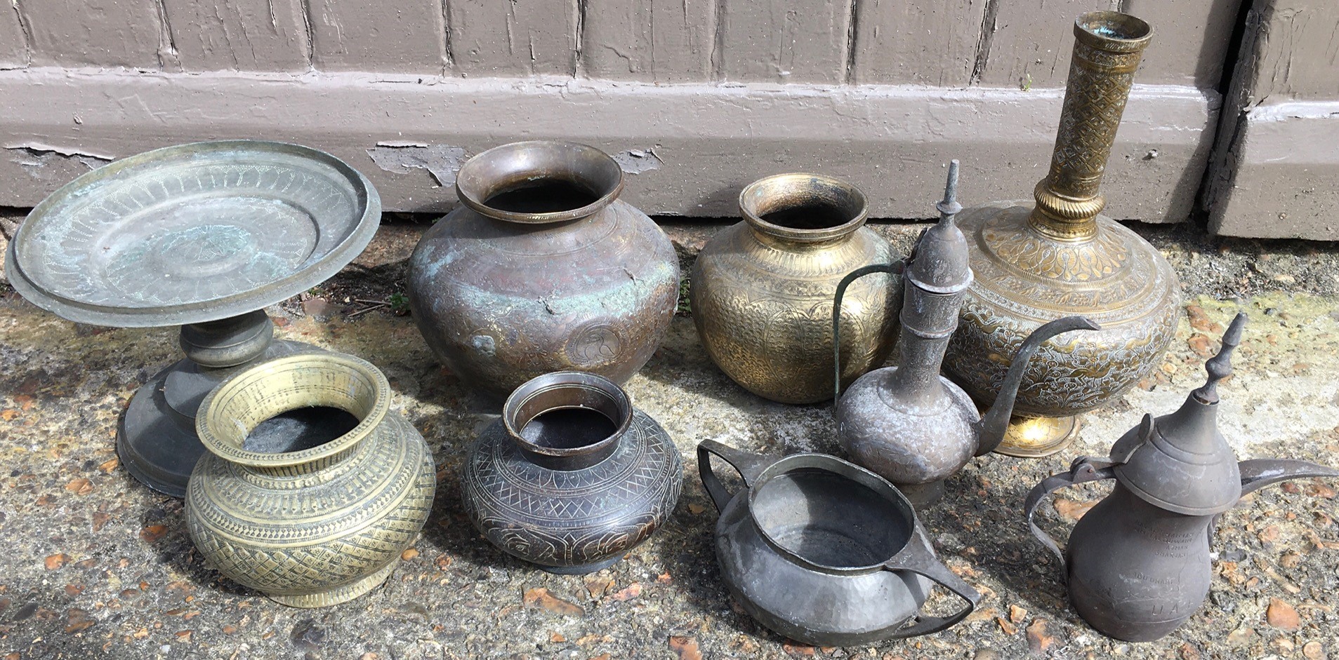 A collection of Indian bronze vases together with similar (qty)