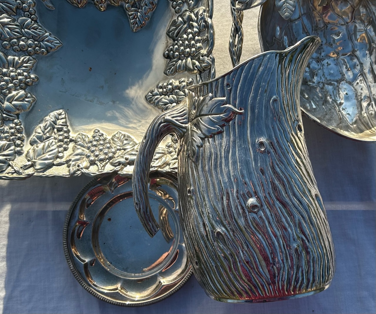 A White metal bark simulated jug and a qty of other silver plated items , total gross slver weight