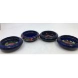 A collection of four Moorcroft art pottery  bowls, diameter: 11cm (4)