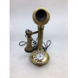 A vintage bronze telephone, serial number: 03051