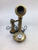 A vintage bronze telephone, serial number: 03051