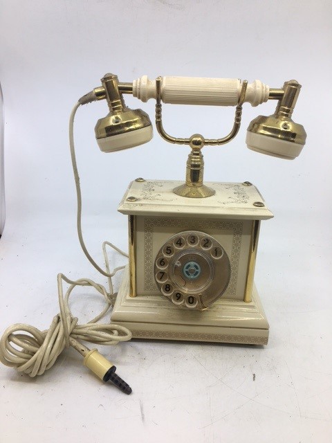 A vintage white telephone, (serial number: 05545)