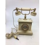 A vintage white telephone, (serial number: 05545)