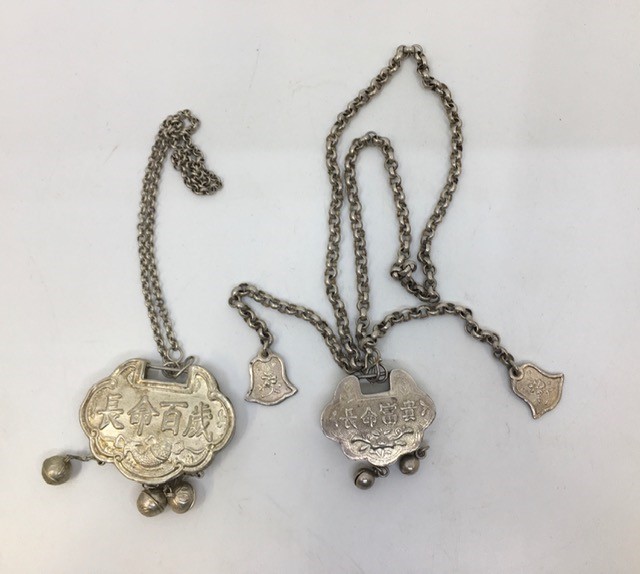 Two Chinese republican white metal charms.(2) - Image 2 of 2