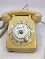 A vintage white bell telephone (CTD PARIS, PROPAITE DE L'ETAT PTT)