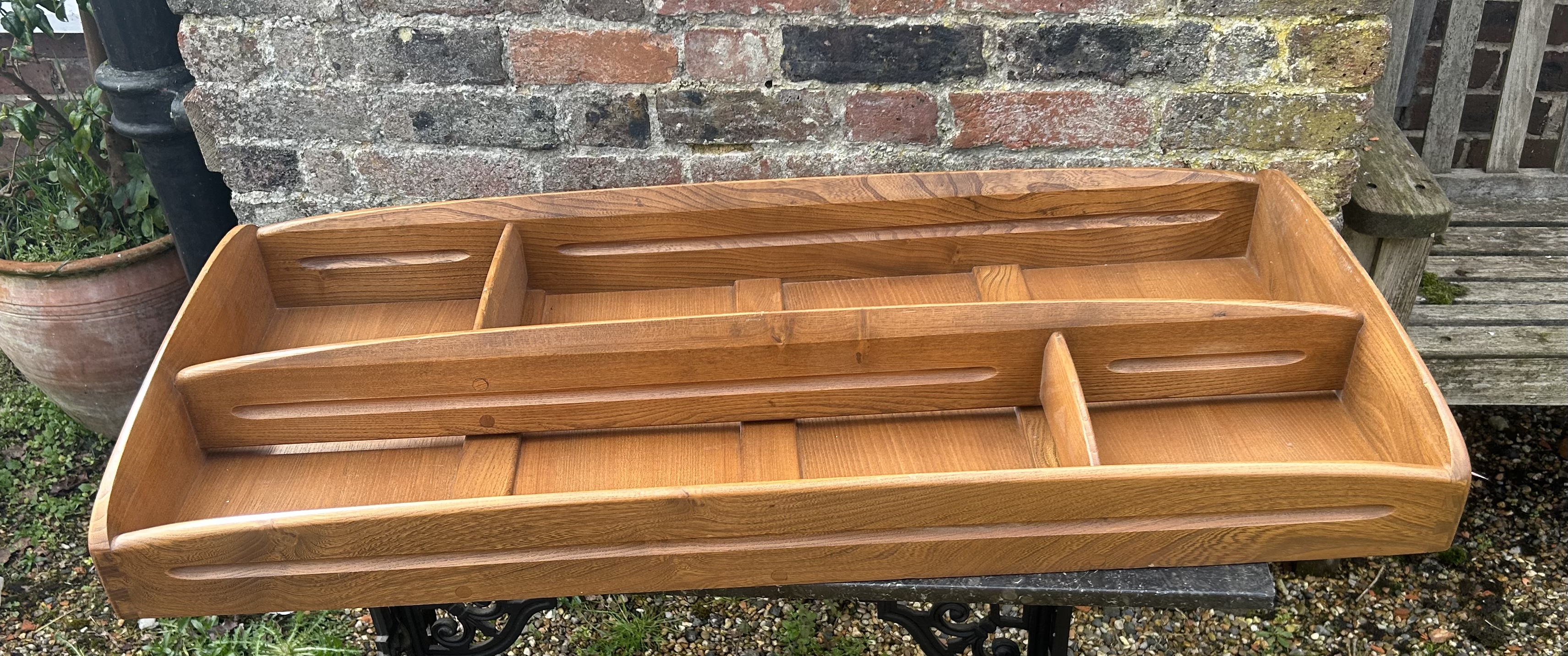 A blue Label Ercol wall plate rack