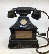 A vintage black telephone (2614)