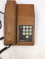 A vintage telephone (TELECOM) (EC 711 15-C)