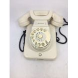A vintage white bell telephone (a/f)