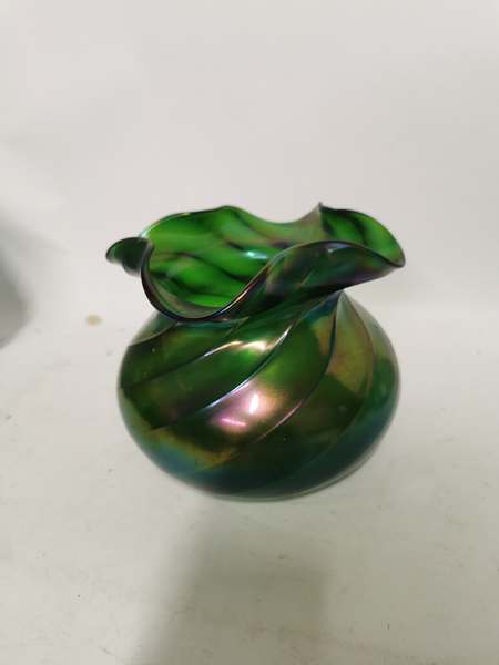 A Bohemian green iridescent glass vase with spiral ribbed design to the body. 14cm high and 17cm - Image 2 of 3