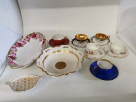 A collection of German porcelain items to include; two Rosenthal cups and saucers, two internally