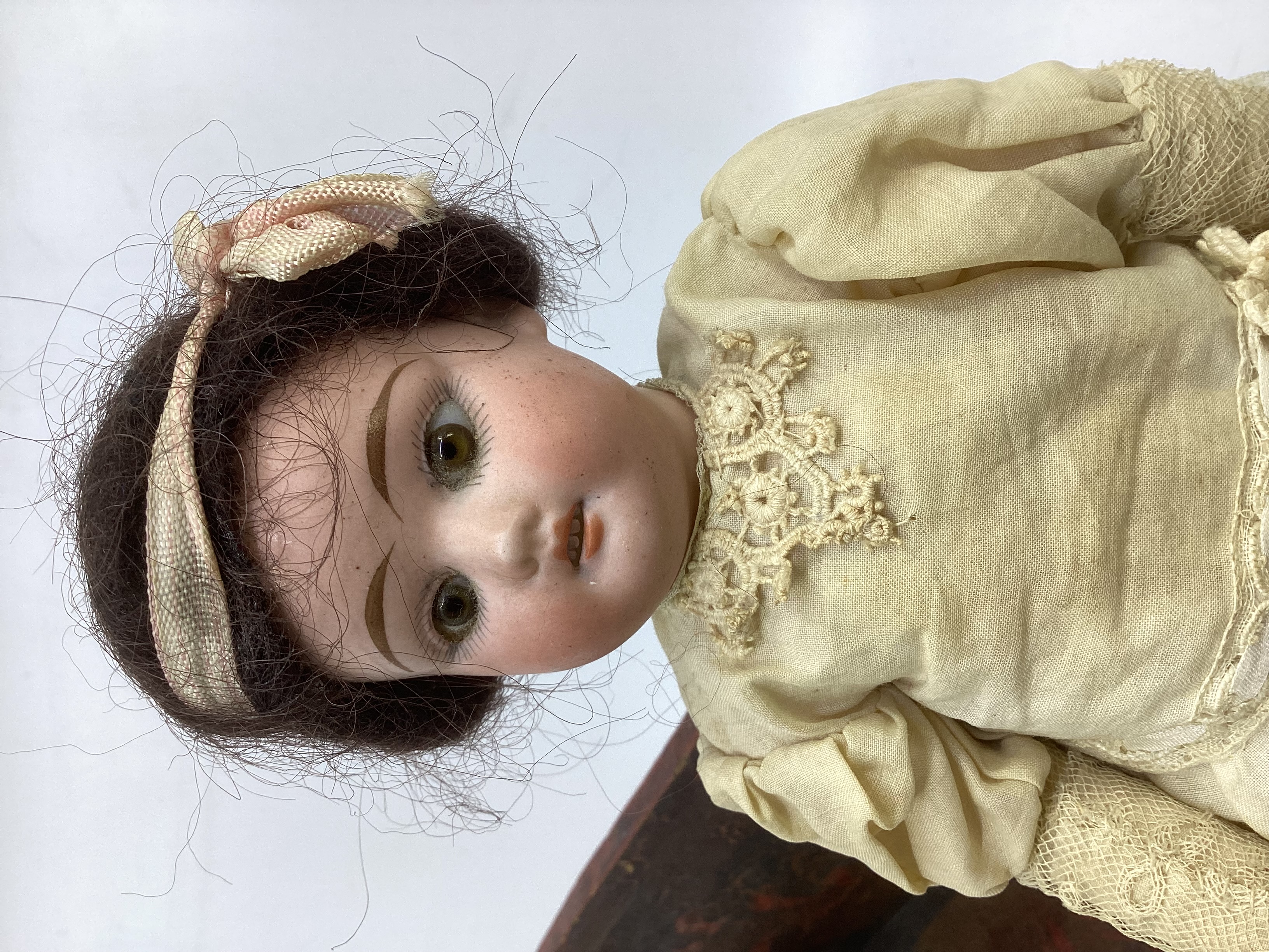 Antique German miniature 9” bisque head fully articulated doll with fixed glass eyes in antique - Image 2 of 4