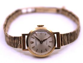 9ct Yellow Gold Ladies Rolex Watch with 9ct Hallmarked Gold Bracelet.  The watch face width is
