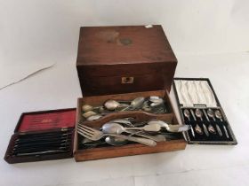 A collection of Silver Plated cutlery in a tray, a cased set of teaspoons, together with a writing