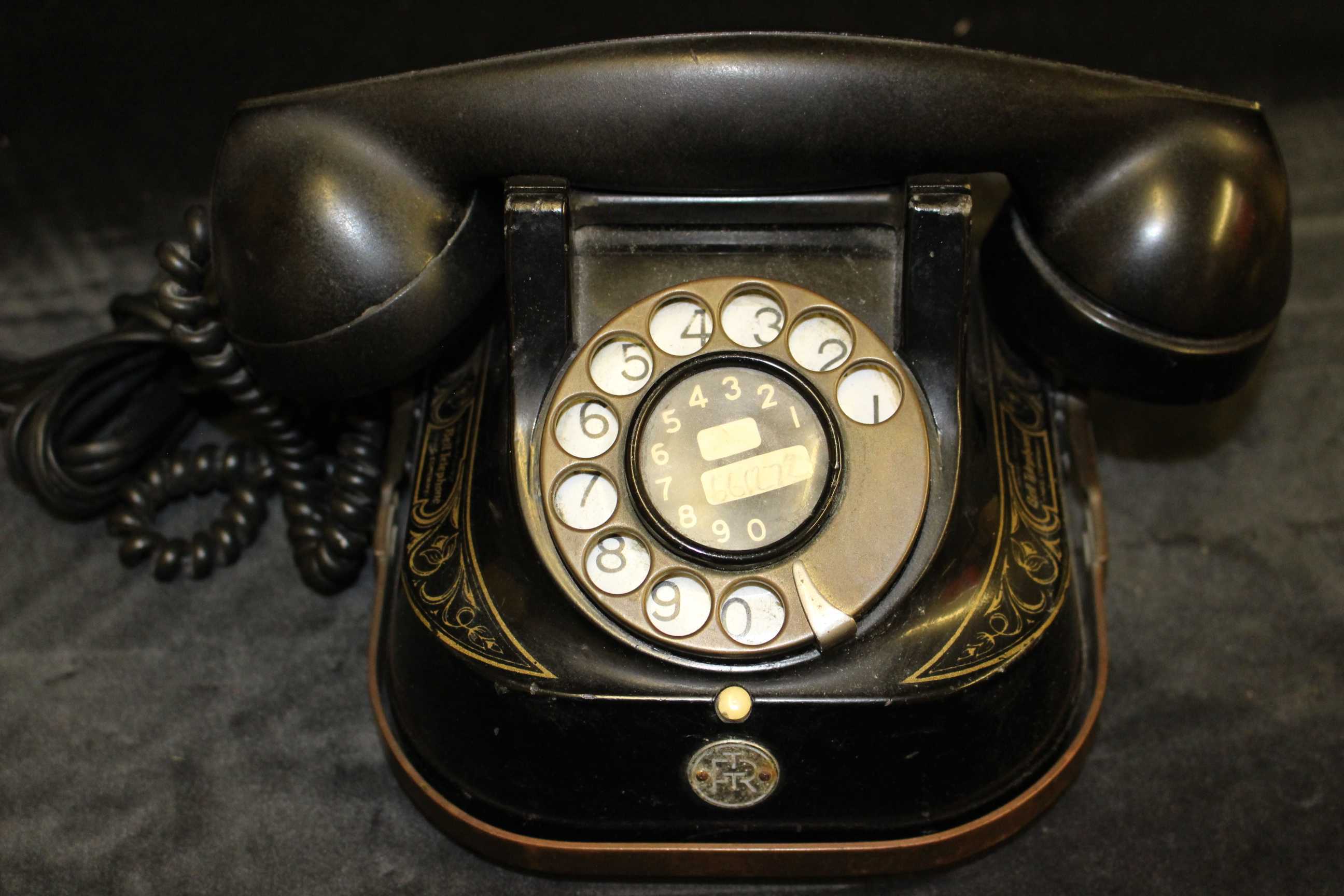 FTR Telephone complete with brass carry handle, looks as though has been converted for modern