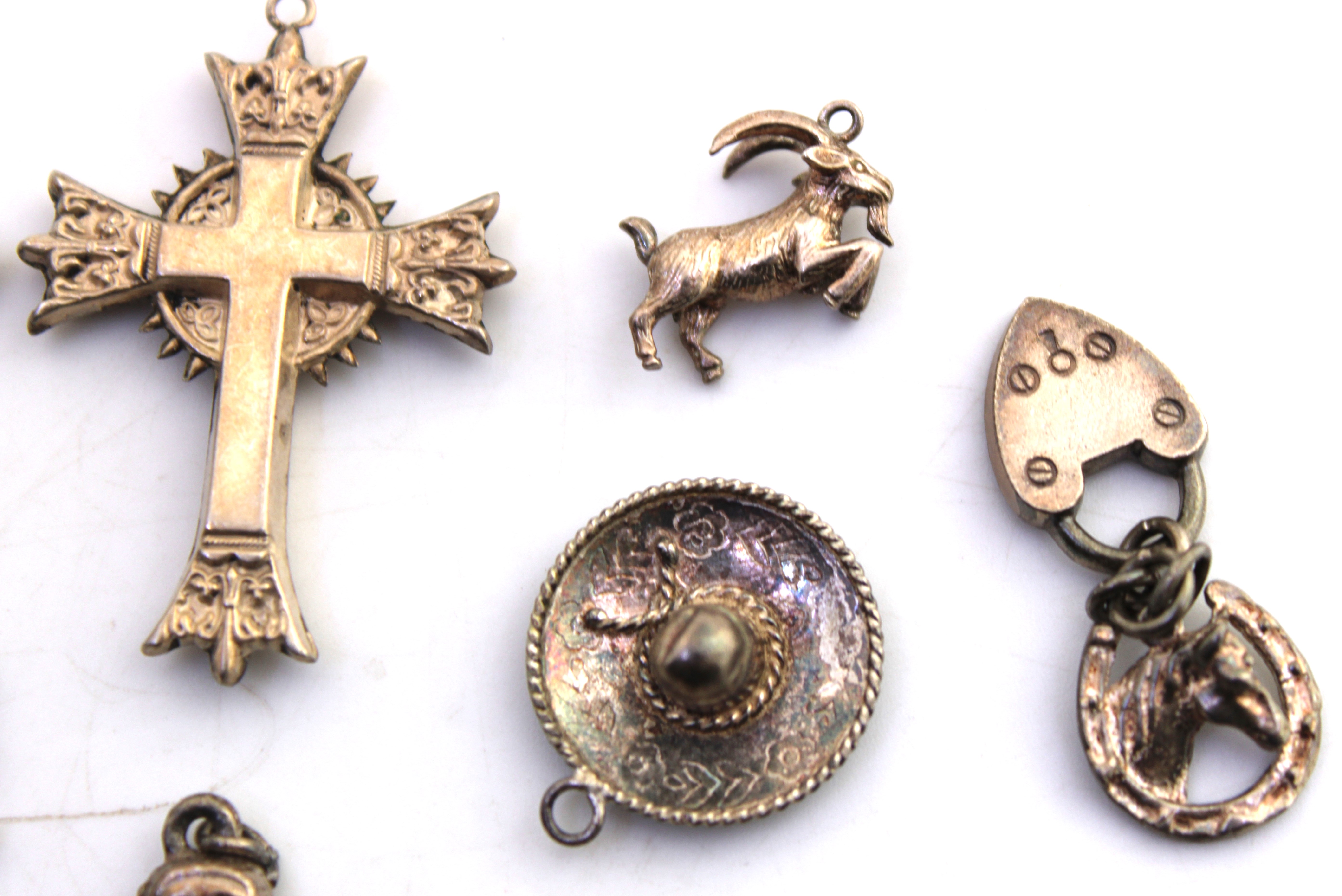 Selection of Sterling Silver and Unmarked White Metal Charms. To include a Genie Lamp, Witch on a - Image 3 of 5