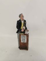 A Royal Doulton figure 'The Auctioneer' HN2988 23cm high, in good condition.