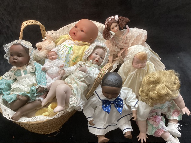 Vintage Artist Modern Porcelain and vinyl collection of dolls and baby dolls all dressed in a willow