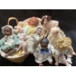 Vintage Artist Modern Porcelain and vinyl collection of dolls and baby dolls all dressed in a willow