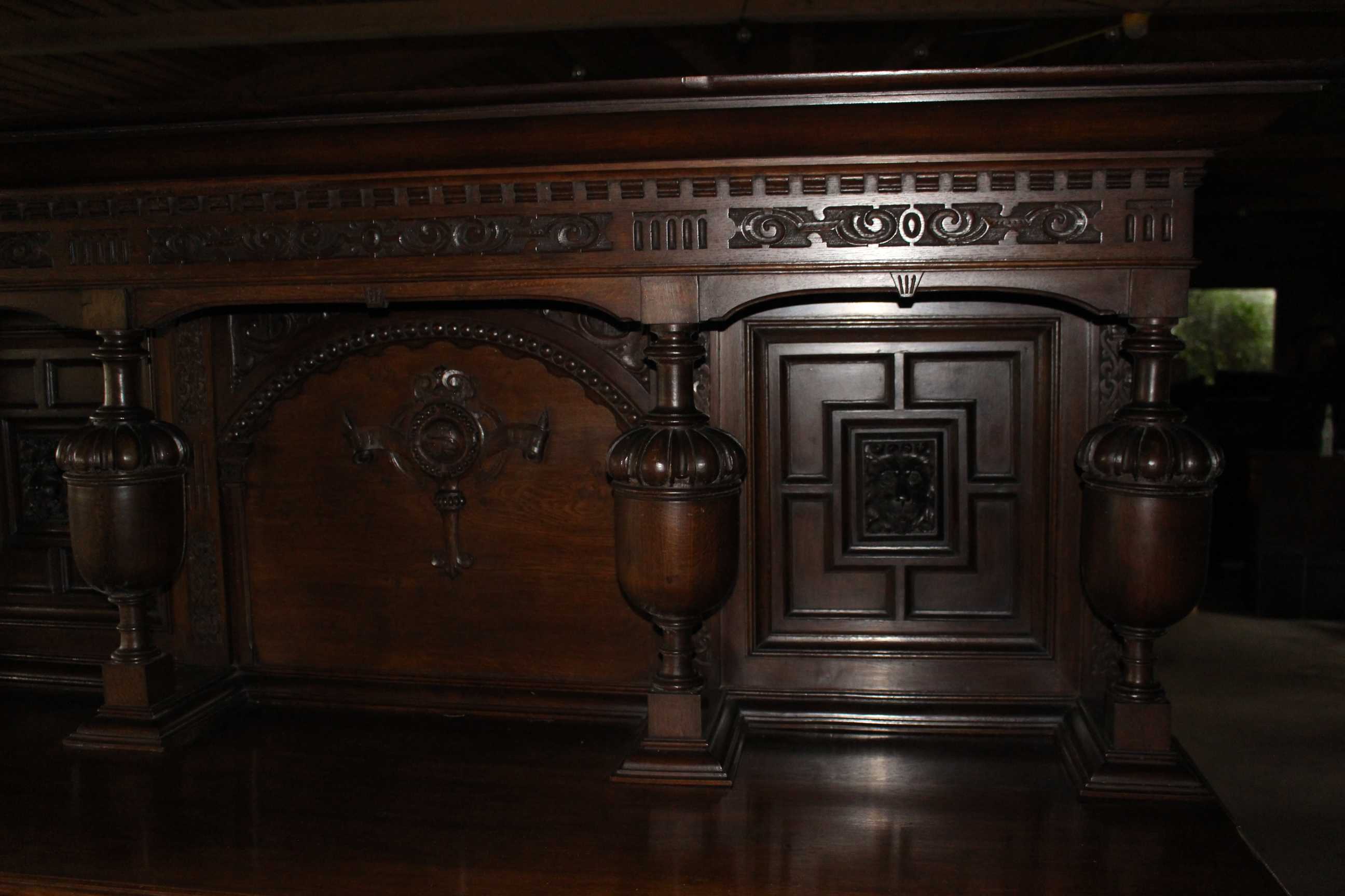 A very large victorian dresser having a raised panel back with the letters J & S carved scroll and - Image 4 of 6