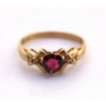 9ct Yellow Gold Heart Shaped Garnet and Cubic Zirconia Ring.  The Heart Shaped Garnet measures