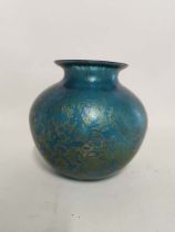 A Brierley green/blue colour iridescent glass vase. Approx 16.5cm high. In good condition (1)