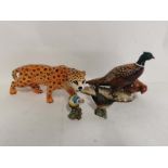 A Beswick pottery figure of a pair of pheasants #2028, together with a Beswick leopard figure and