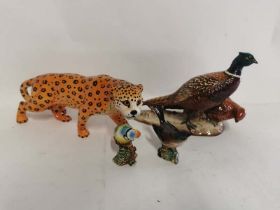A Beswick pottery figure of a pair of pheasants #2028, together with a Beswick leopard figure and