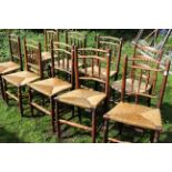 Nine c1900 Rush seated mostly spindle back chairs. (9)