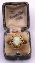 18ct Yellow Gold Oval Opal Cabochon ring. Length:12.12mm x Width: 9.21mm x 2.80mm depth.  The Oval