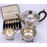 A Silver Plated Tea Set comprising of a Teapot with ebonized handle & finial, Milk Jug and Sugar