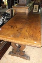 A 1930s oak dining room draw leaf table. Complete with 4 x leather seated chairs and 1 x arts and