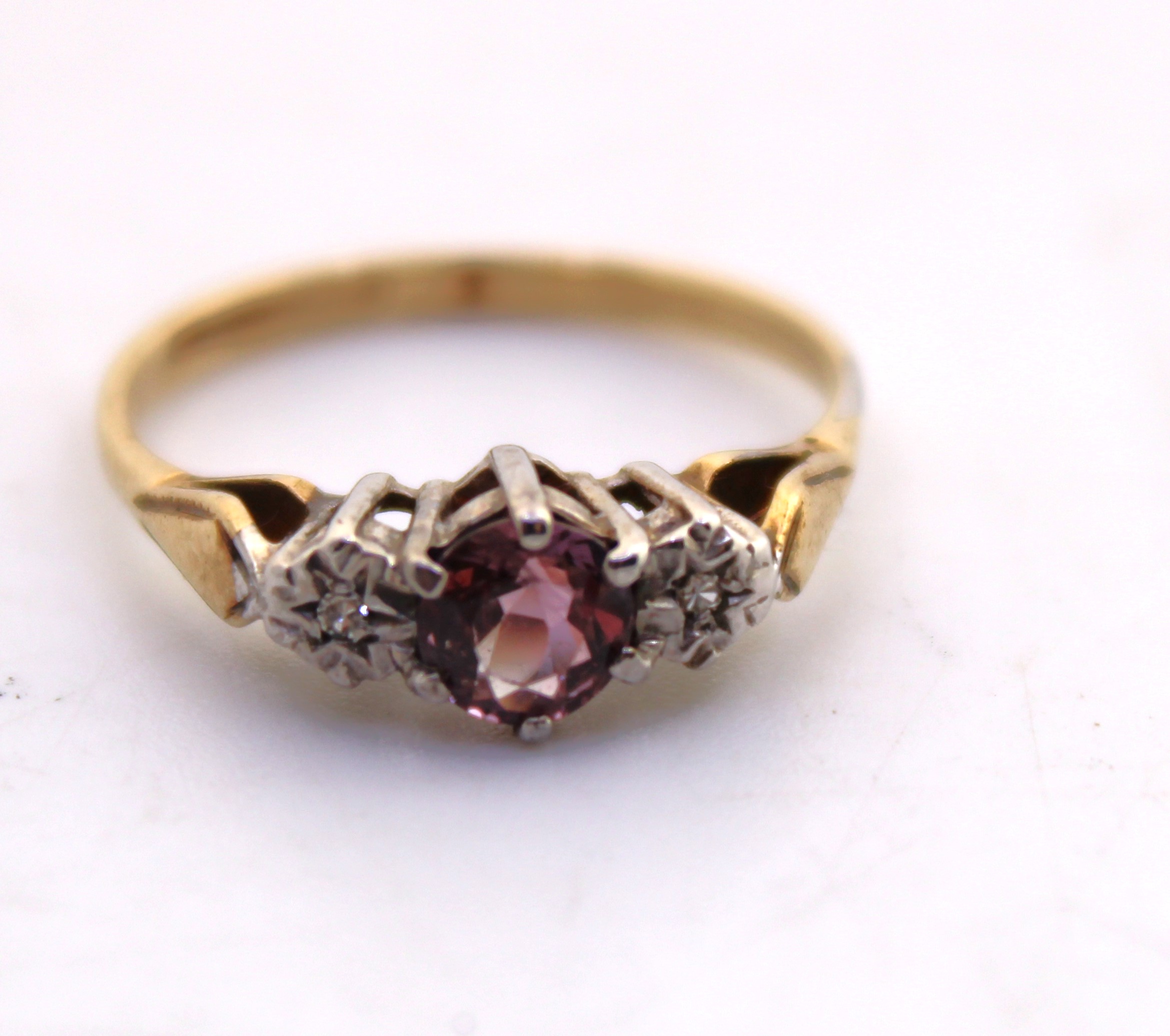 9ct Yellow Gold Round Brilliant Cut Pink Stone and Diamond Ring.  The Centre Pink Stone measures