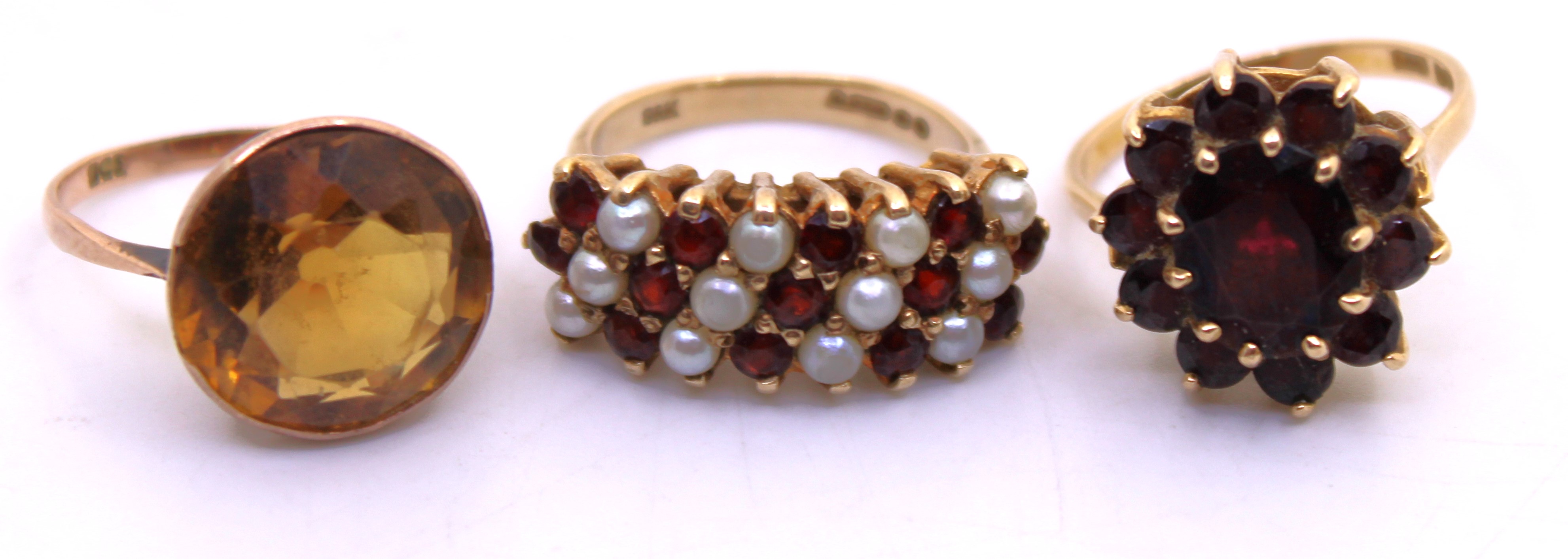 Group of three 9ct Gold dress rings.  To include a 9ct Gold Garnet Cluster ring, a 9ct Gold Cultured
