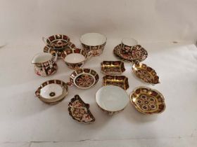 A collection of Royal Crown Derby English bone china, Imari pattern pieces to include; various pin