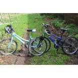 2 x Childrens mountain bikes with accessories.