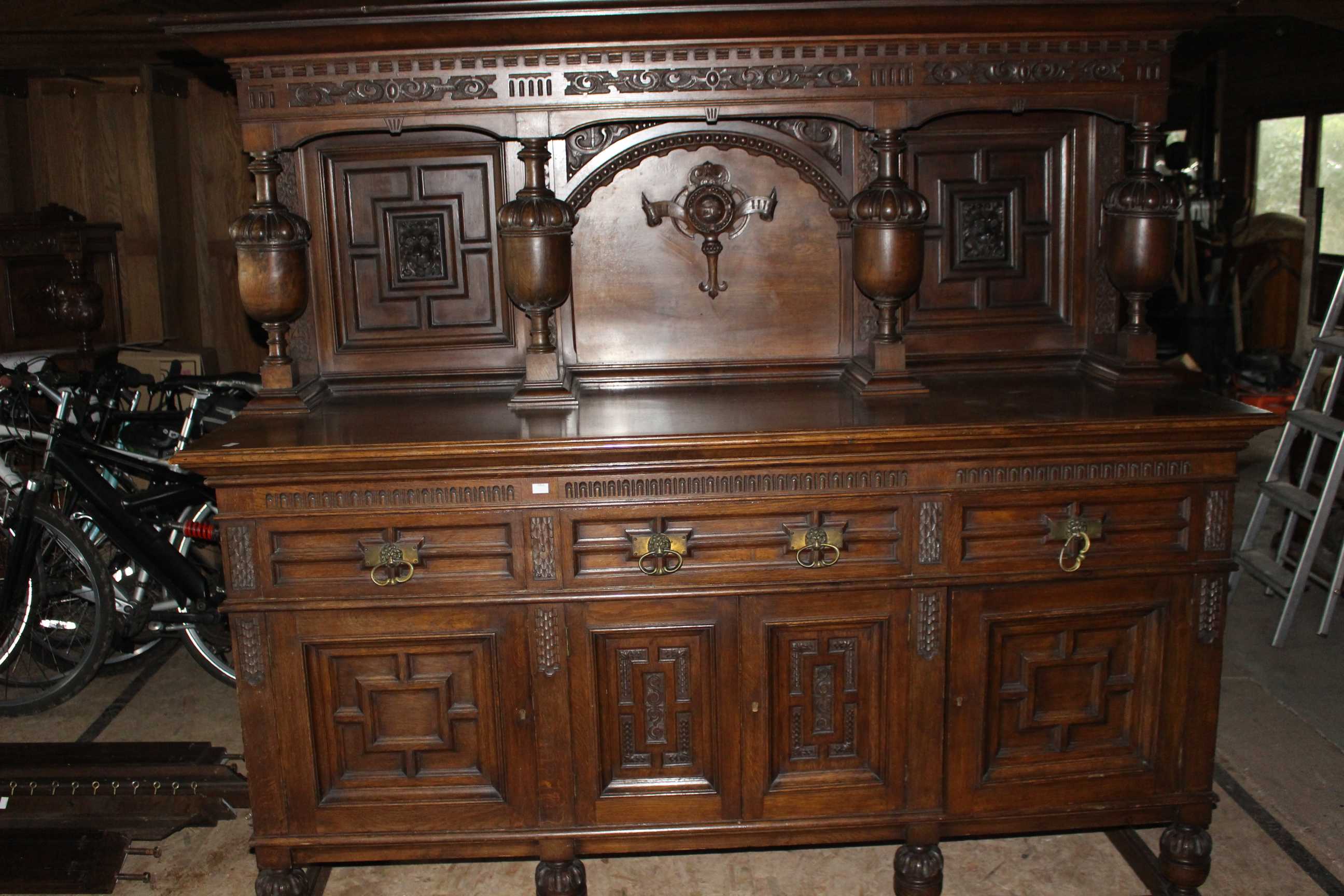 A very large victorian dresser having a raised panel back with the letters J & S carved scroll and - Image 2 of 6