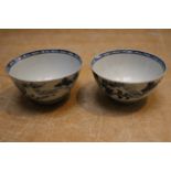 A near pair of 18th century Liverpool tea bowls printed in underglaze blue with "Bird on a