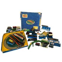 A collection of Mid-Century and earlier OO gauge Hornby trains and accessories to include a Hornby