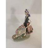 A Lladro porcelain figure; 1419 A Barrel Of Blossoms in box. Figure is over all in good condition (