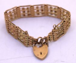 9ct Yellow Gold Gate Bracelet with Padlock & Safety Chain.  The width of the bracelet is approx.