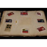 An album containing a number of silk cards for Regiments, Butterflies, Battleships, Countries etc