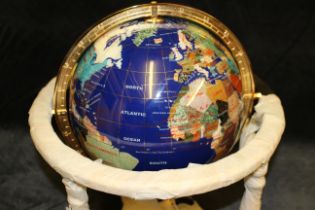 An Iccy co ltd specimen stone terrestrial table globe, gimbal mounted  on gilt metal stand, boxed