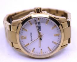 Accurist Gold Tone Quartz Watch. Boxed.  The watch also comes with its Guarantee and special