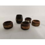 4 wooden napkin rings with plaques stating they are from the ships; x2 HMS Victory, HMS Iron Duke,