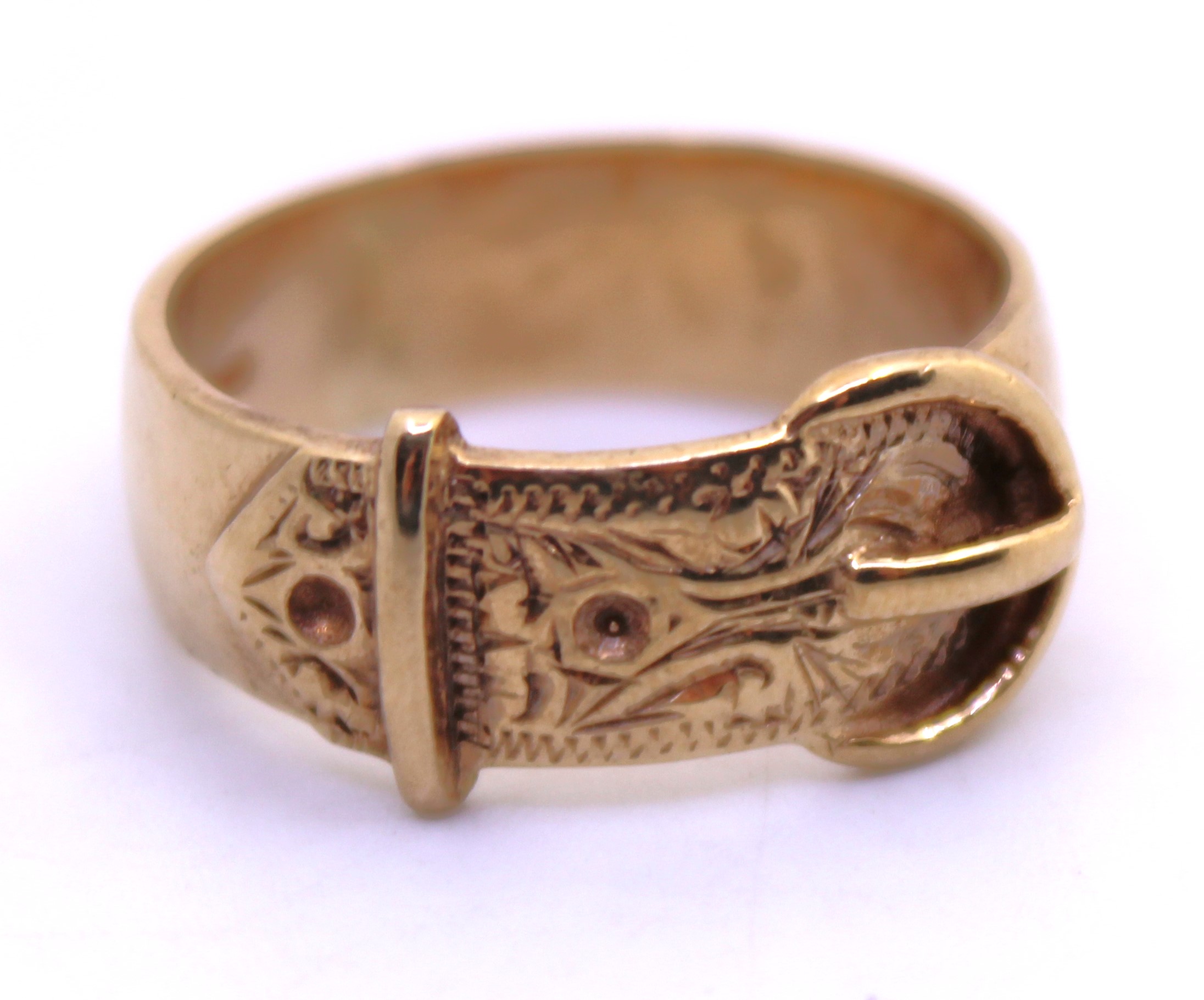 9ct Yellow Gold Buckle Ring.  Ring Size M 1/2 centre.  Total weight is approx. 4.8 grams.