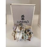 A Lladro porcelain figure 05735 Big Sister, 22cm long, in box. Figure is in good condition, box is